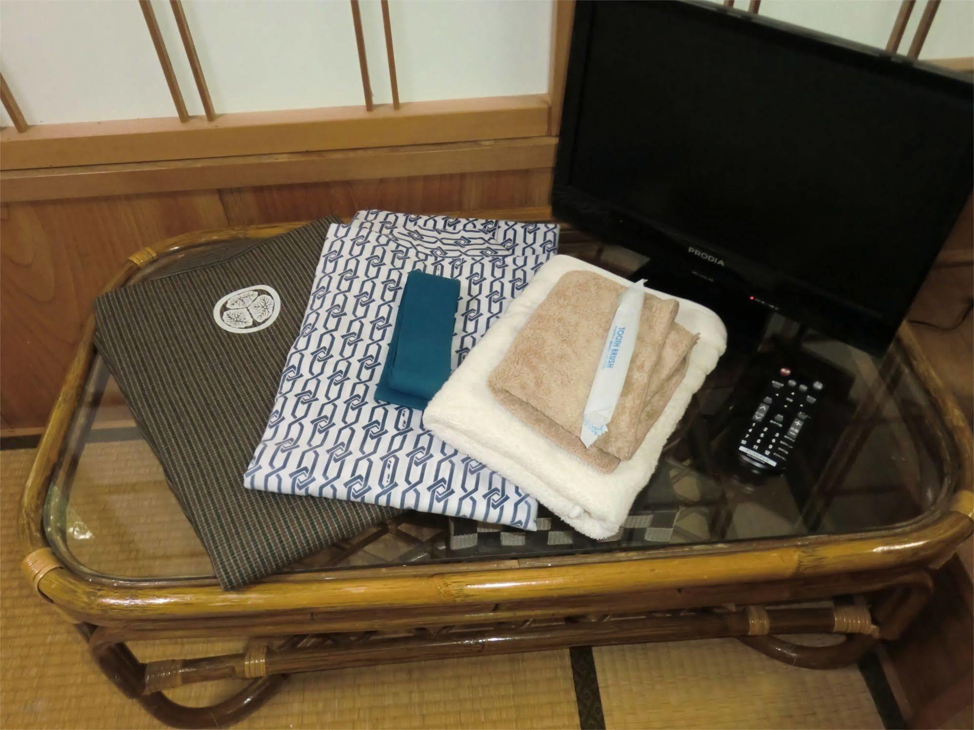 Onsen Minshuku Sakaeya Hotel Shizukuishi Bagian luar foto