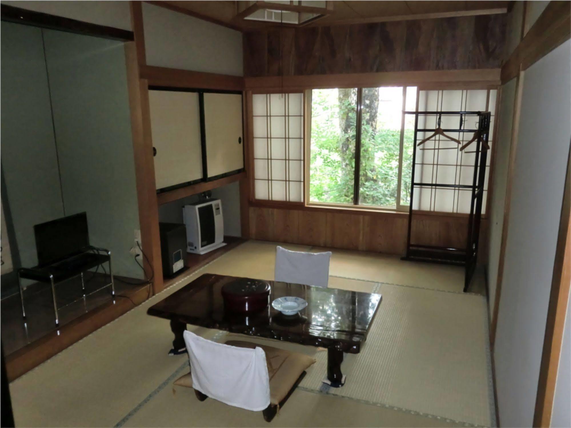 Onsen Minshuku Sakaeya Hotel Shizukuishi Bagian luar foto